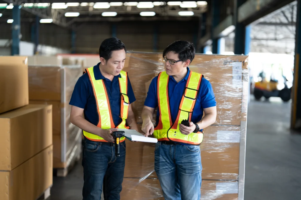 Two men discussing returns process