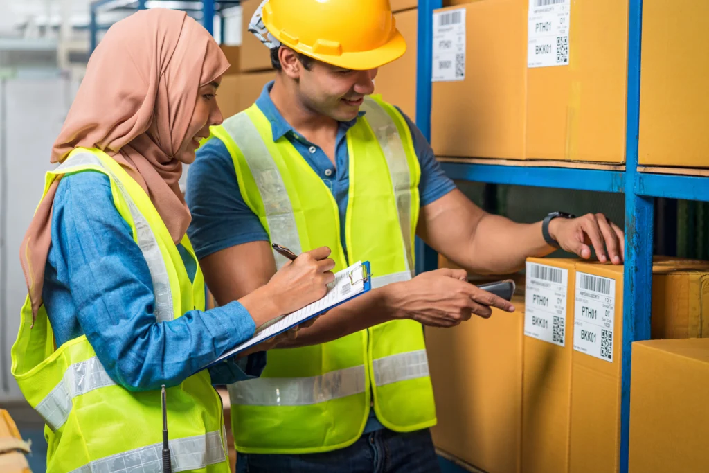 Asian worker scanning a barcode